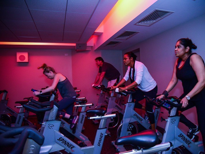 CompleteBody Financial District Members in a Spin Class